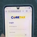 NPWP Online: Cara Daftar, Syarat, dan Tahapan Verifikasi Ilustrasi pengguna login untuk melakukan membuat registrasi membuat NPWP online